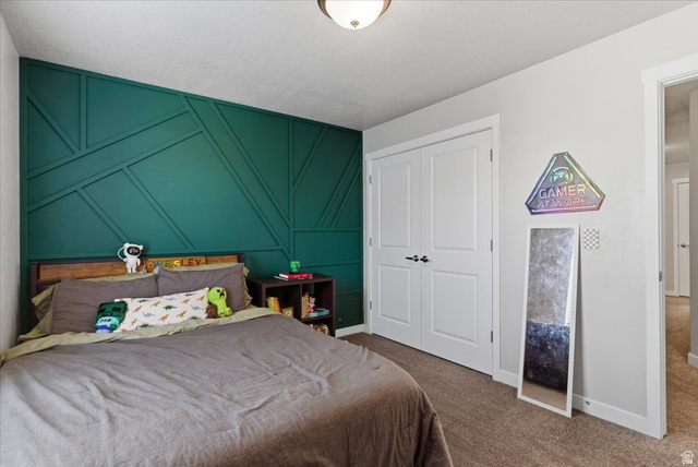 370 West Knights Lane Layton, UT 84041 - Photo 29 of 31 Accent wall featuring geometric paneling in a deep green hue