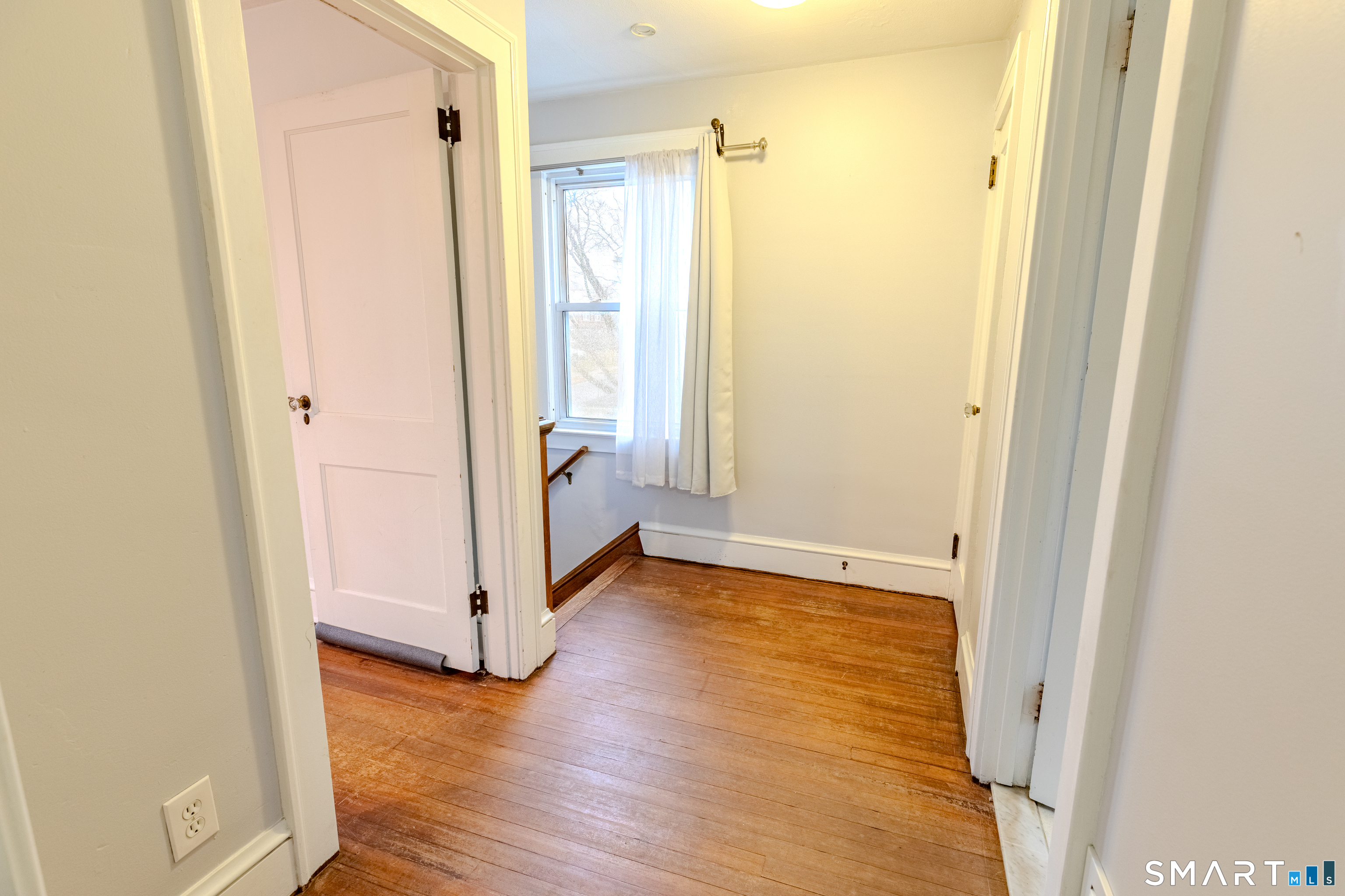 61 Woodmere Road West Hartford, CT 06119 - Photo 32 of 37 a view of a bathroom with wooden floor