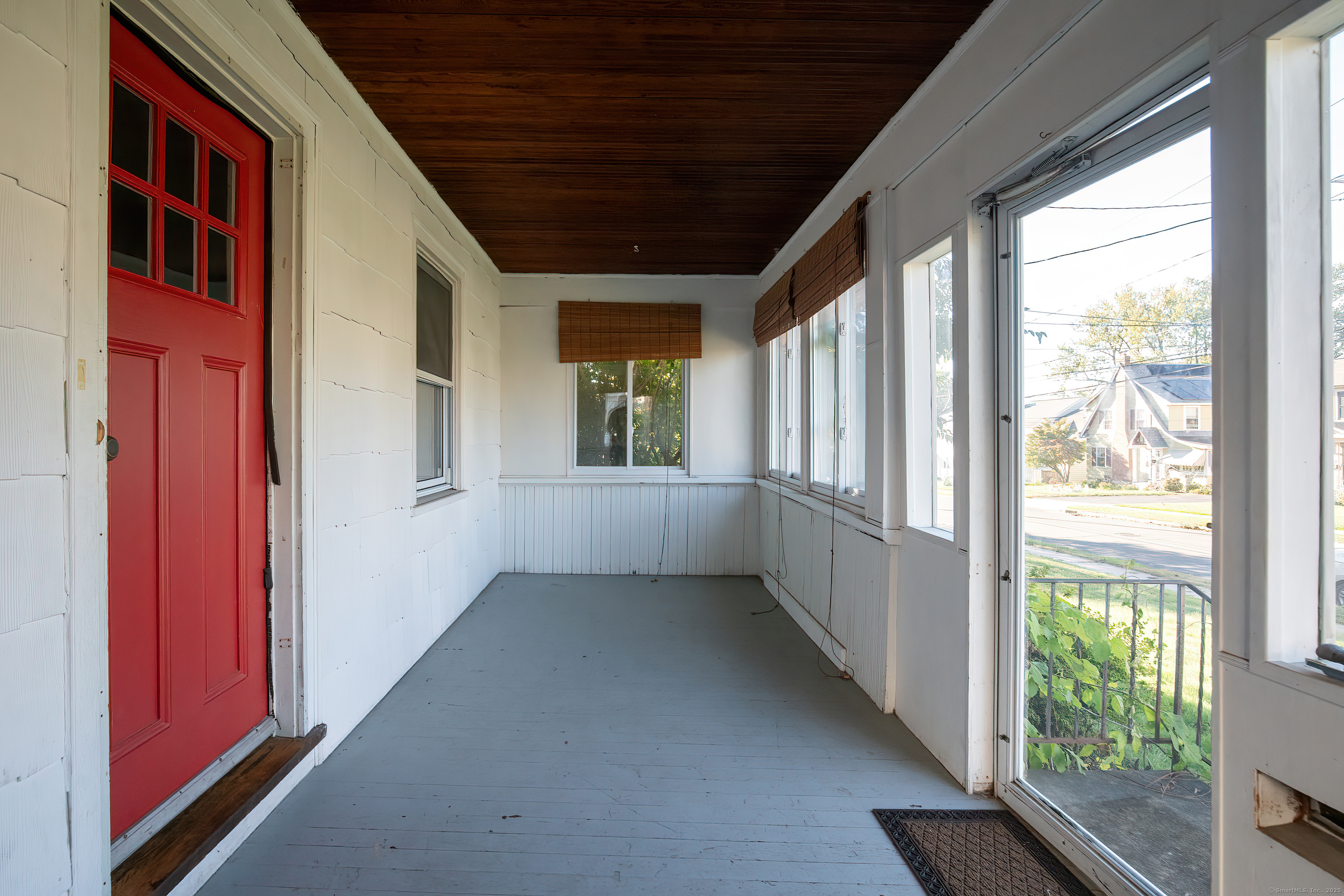61 Woodmere Road West Hartford, CT 06119 - Photo 5 of 37 a view of an empty room with a window