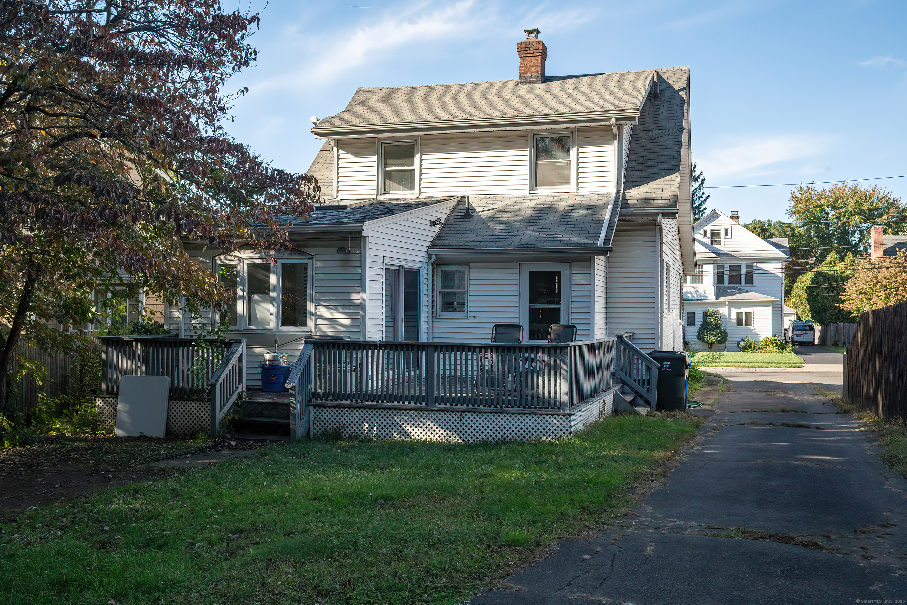 61 Woodmere Road West Hartford, CT 06119 - Photo 6 of 37 a front view of a house with garden