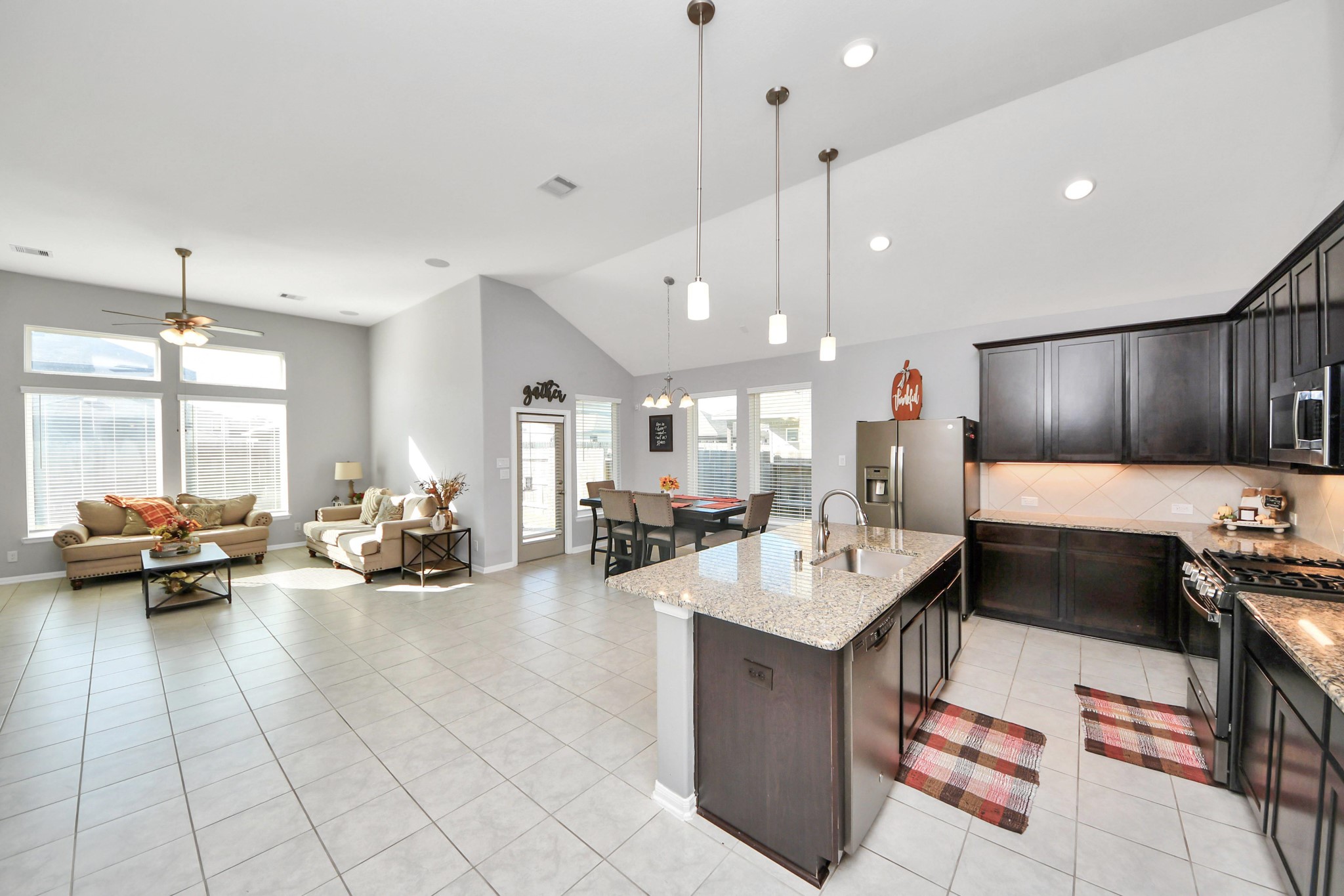 427 Alaska Cedar Drive Crosby, TX 77532 - Photo 12 of 35 a living room with furniture and a flat screen tv
