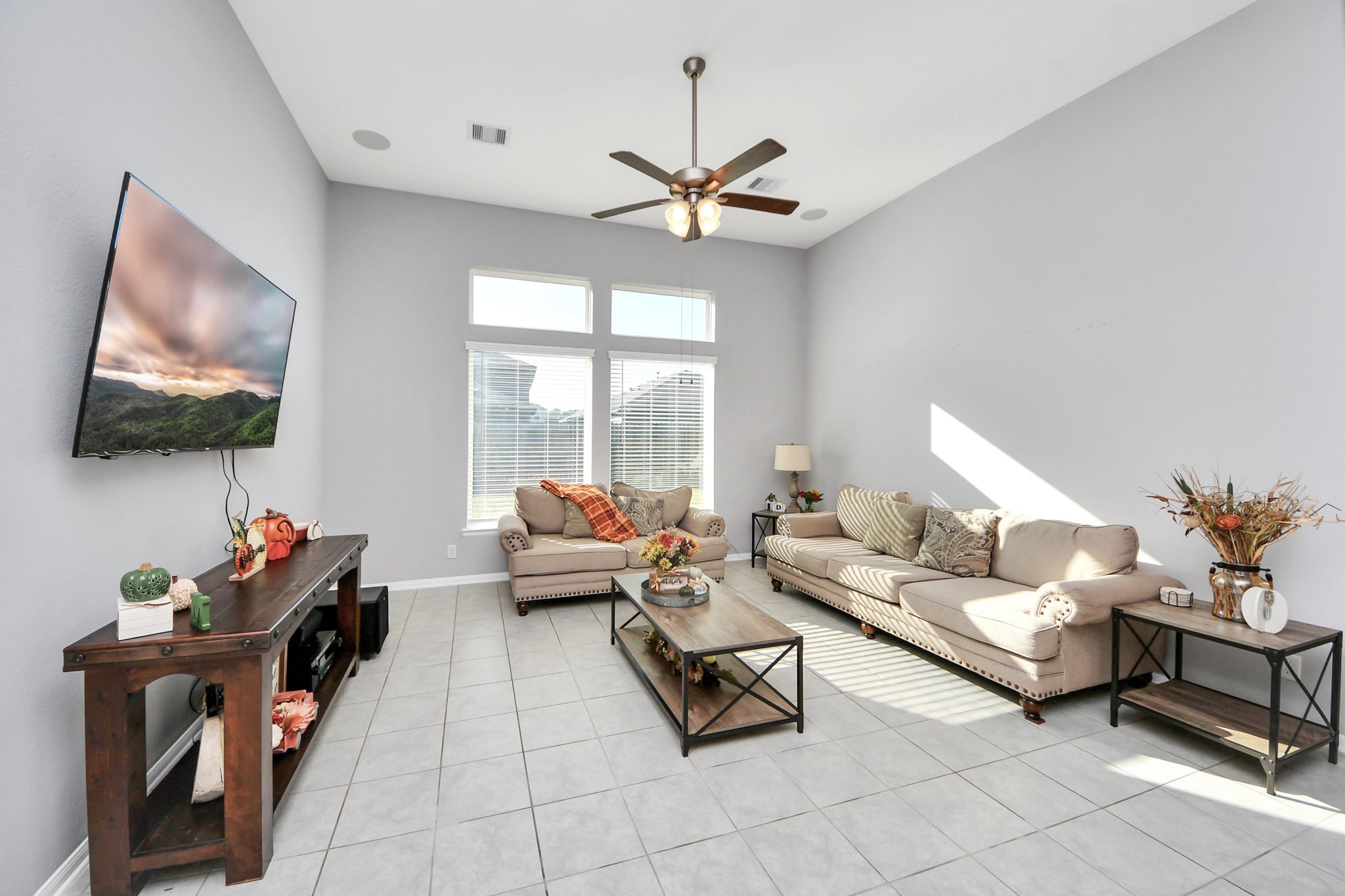 427 Alaska Cedar Drive Crosby, TX 77532 - Photo 20 of 35 a living room with furniture and a flat screen tv