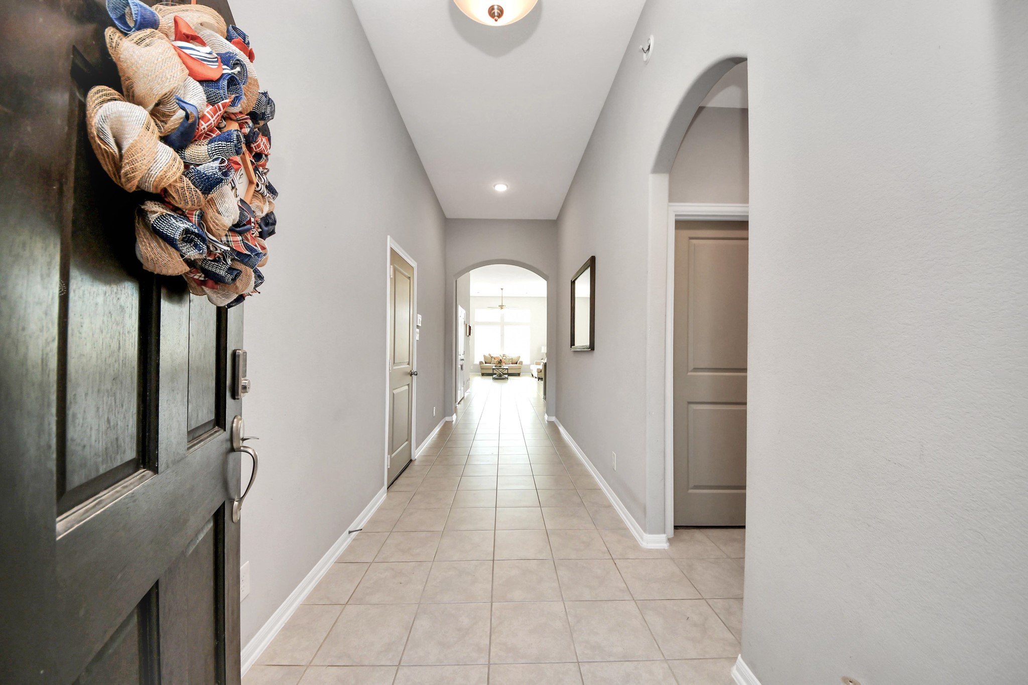 427 Alaska Cedar Drive Crosby, TX 77532 - Photo 2 of 35 a view of a hallway with wooden floor
