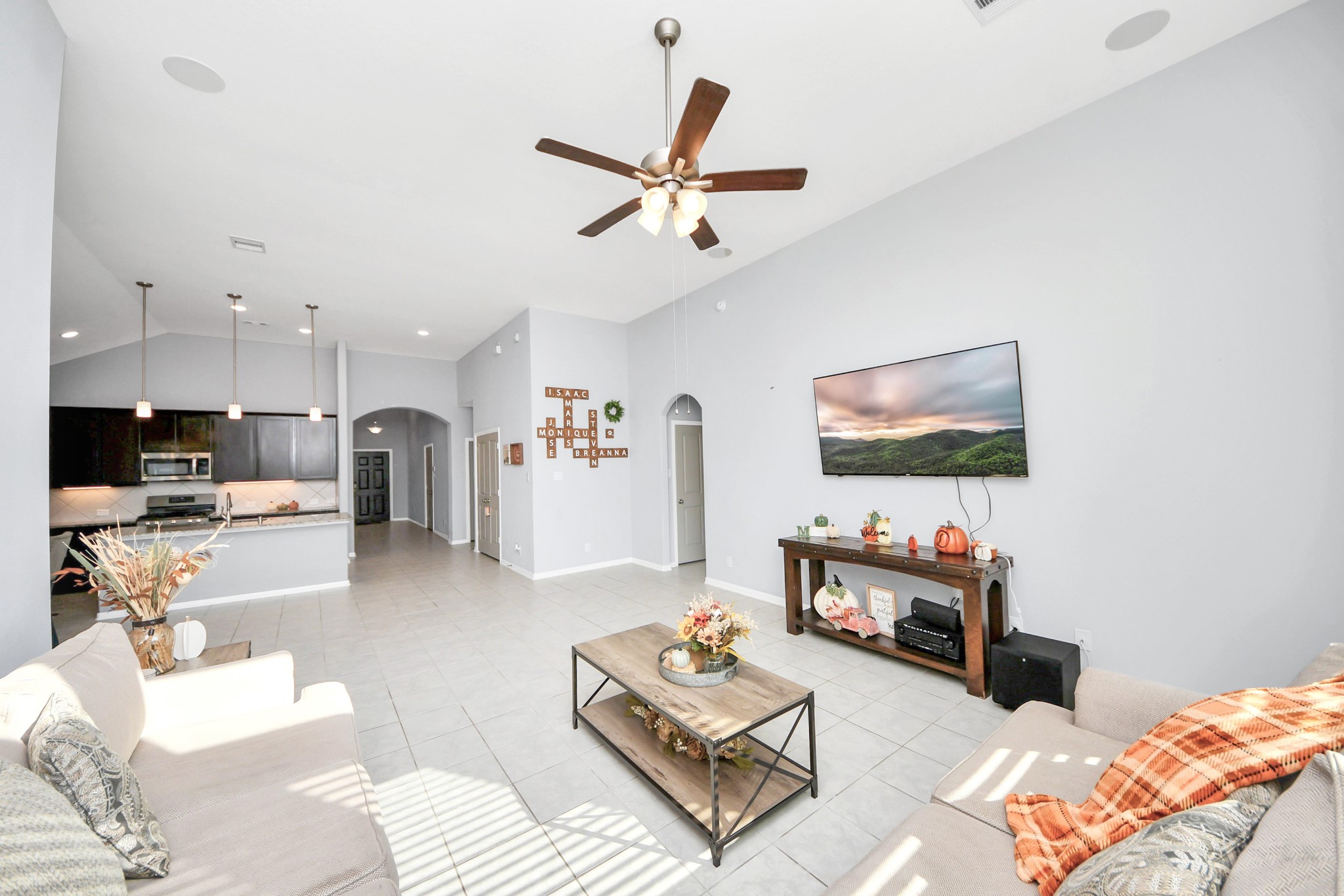 427 Alaska Cedar Drive Crosby, TX 77532 - Photo 21 of 35 a living room with furniture and a flat screen tv