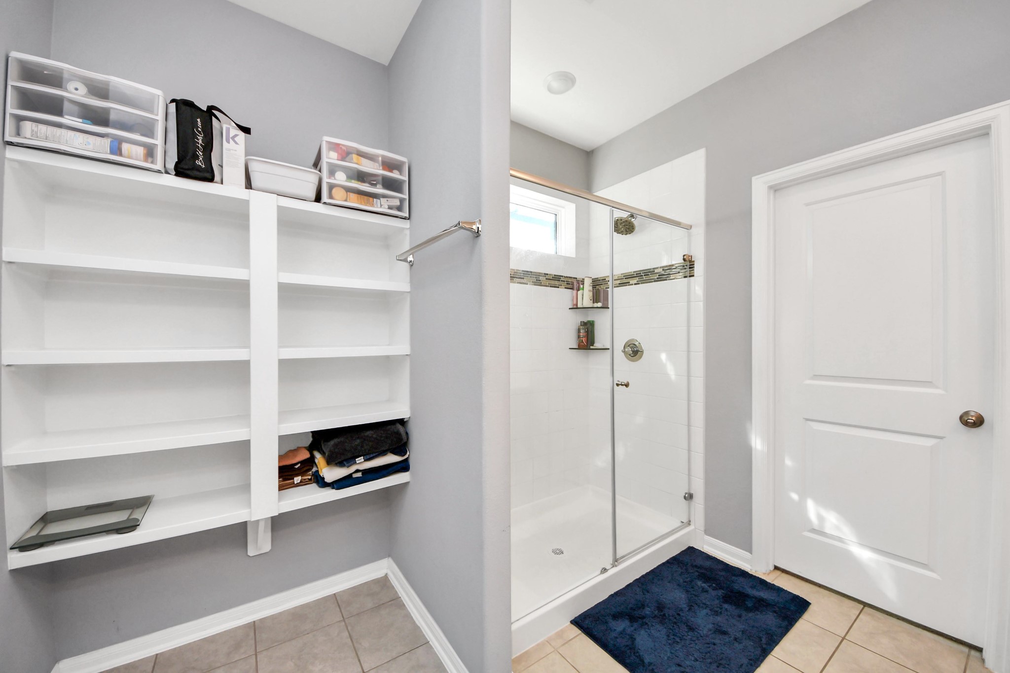 427 Alaska Cedar Drive Crosby, TX 77532 - Photo 28 of 35 a view of walk in closet with empty racks