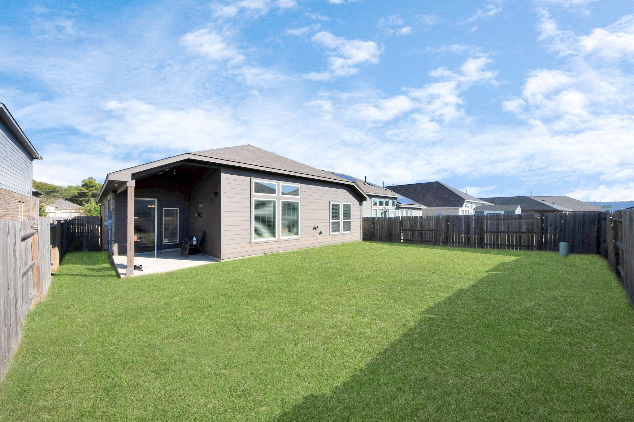 427 Alaska Cedar Drive Crosby, TX 77532 - Photo 32 of 35 a view of a house with backyard and garden