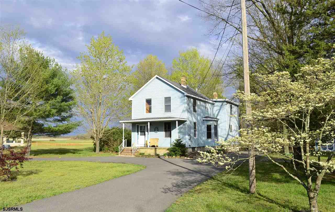 232 Middle Road Hammonton, NJ 08037 - Photo 1 of 1 a view of a white house next to a yard with big trees