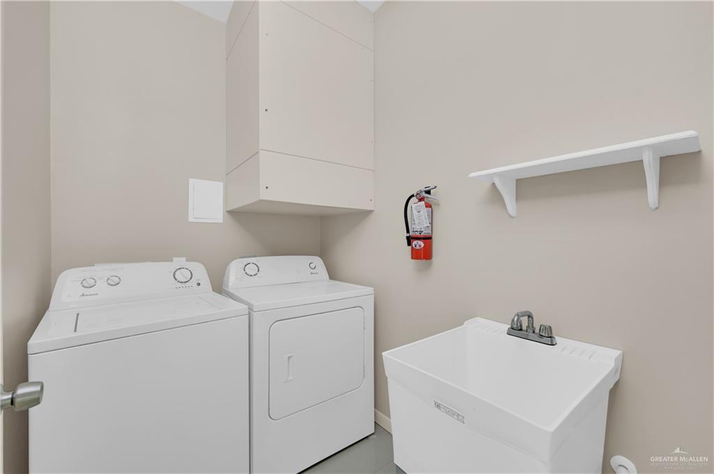 3004 South L Street, Unit 2 McAllen, TX 78503 - Photo 13 of 13 a utility room with dryer and washer