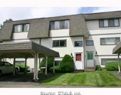 26 Salmon Run, Unit 26 Suffield, CT 06078 - Photo 1 of 1 a view of a house with a porch