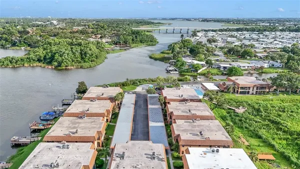 an aerial view of a house with a garden