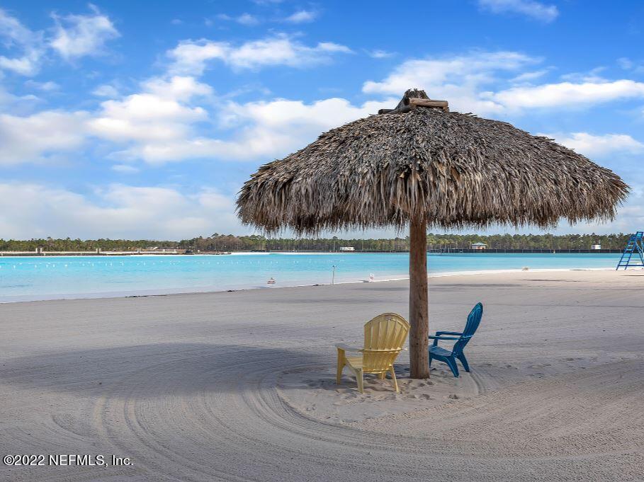 461 Rum Runner Way St. Johns, FL 32259 - Photo 4 of 13 a view of swimming pool with a table and chairs