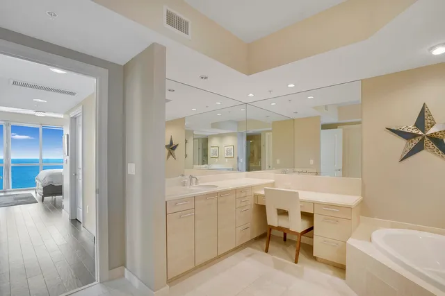 a bathroom with a sink a toilet and a bathtub