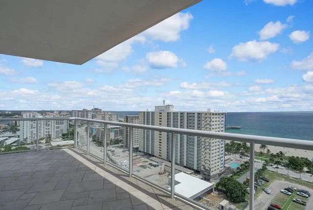 a view of a balcony with city view