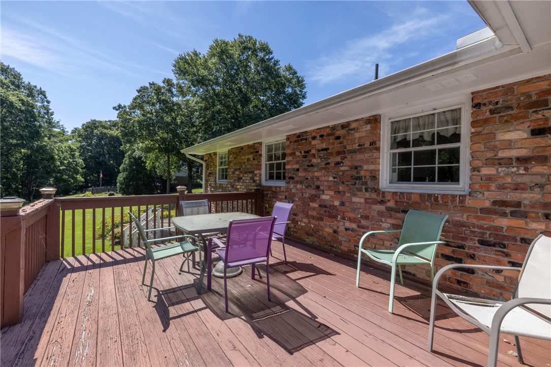 706 Pinewood Drive Pendleton, SC 29670 - Photo 25 of 35 A spacious wooden deck provides ample outdoor living space, perfect for entertaining.