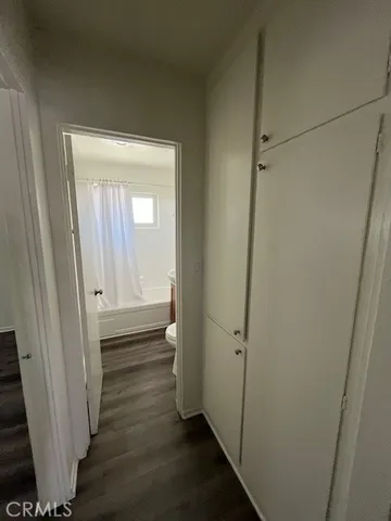 a view of a bathroom from a hallway