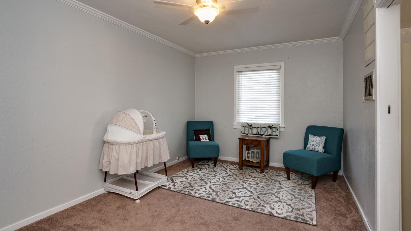 255 Brighton Road Pacifica, CA 94044 - Photo 16 of 29 a living room with furniture and a window