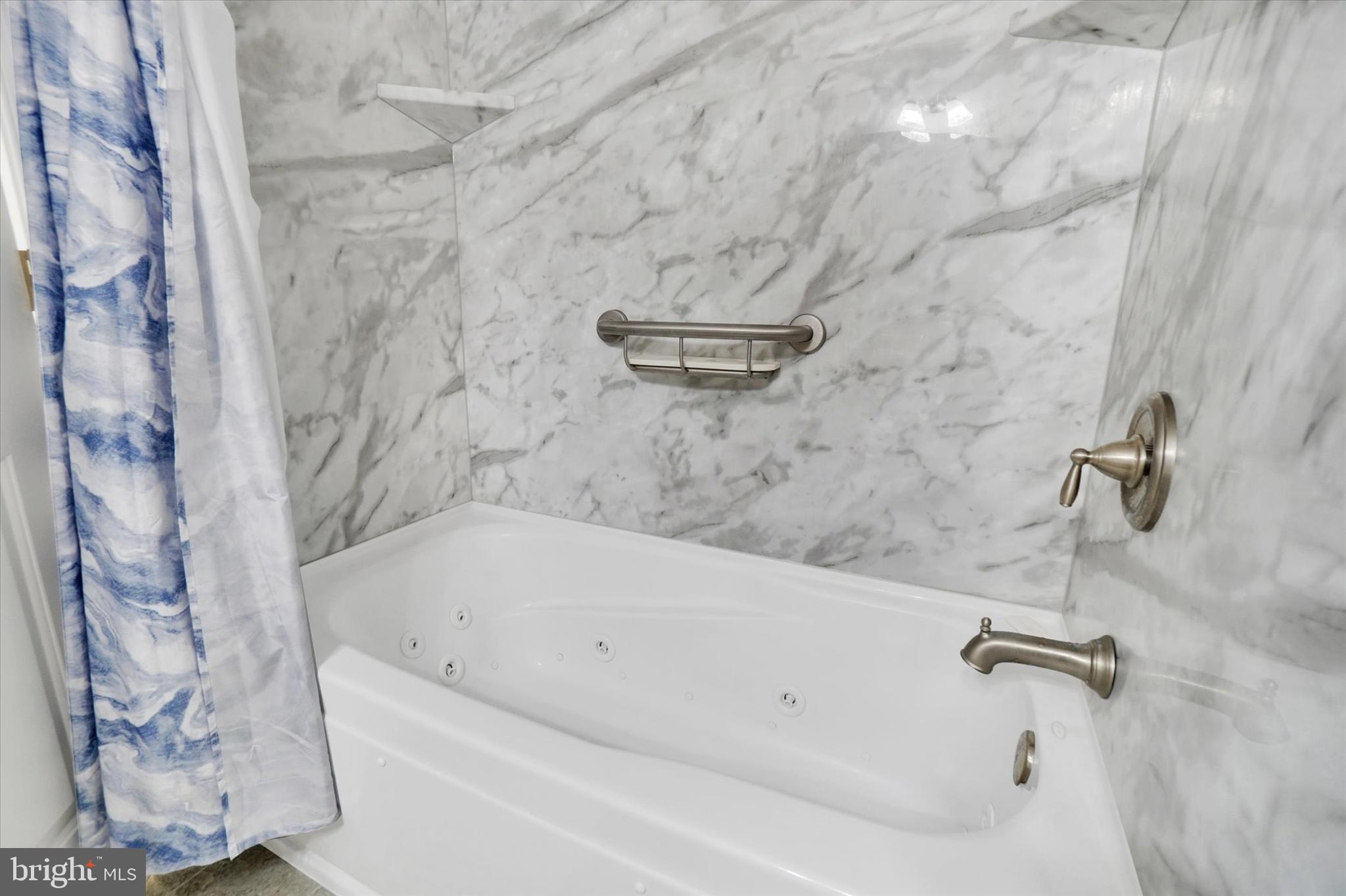 102 Marshview Road, Unit 102 Stewartstown, PA 17363 - Photo 15 of 25 showcases a Whirlpool alcove jetted tub!