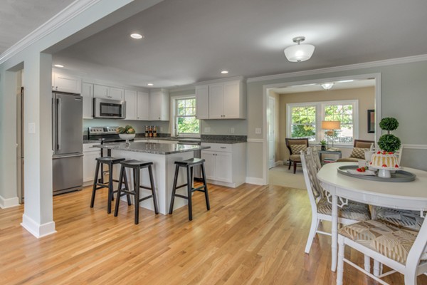 10 Janet Road Arlington, MA 02474 - Photo 11 of 26 a view of a dining room with furniture and wooden floor