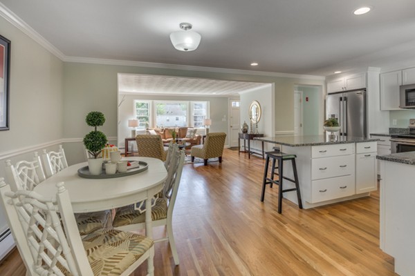 10 Janet Road Arlington, MA 02474 - Photo 12 of 26 a view of a dining room with furniture and wooden floor