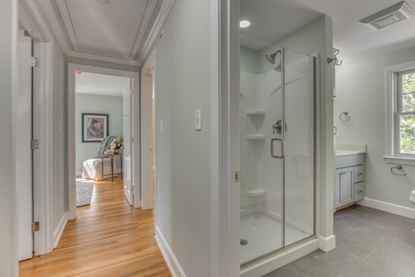 10 Janet Road Arlington, MA 02474 - Photo 18 of 26 a view of a bathroom from a hallway