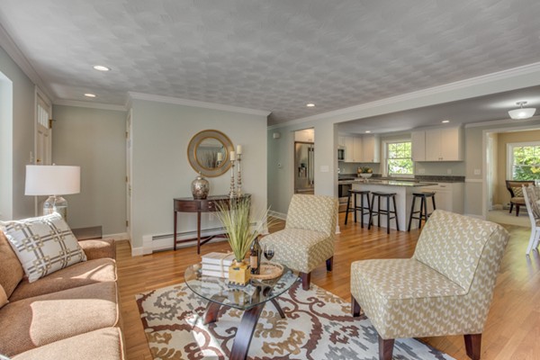 10 Janet Road Arlington, MA 02474 - Photo 9 of 26 a living room with furniture wooden floor and a table