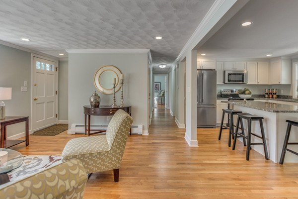 10 Janet Road Arlington, MA 02474 - Photo 10 of 26 a living room filled with furniture and a wooden floor