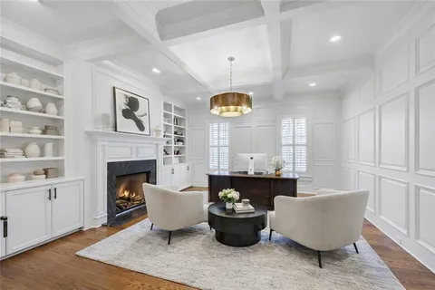 a bed room with furniture and a chandelier