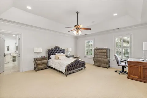 a spacious bathroom with a double vanity sink mirror and double
