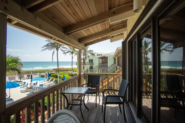a view of a yard and swimming pool