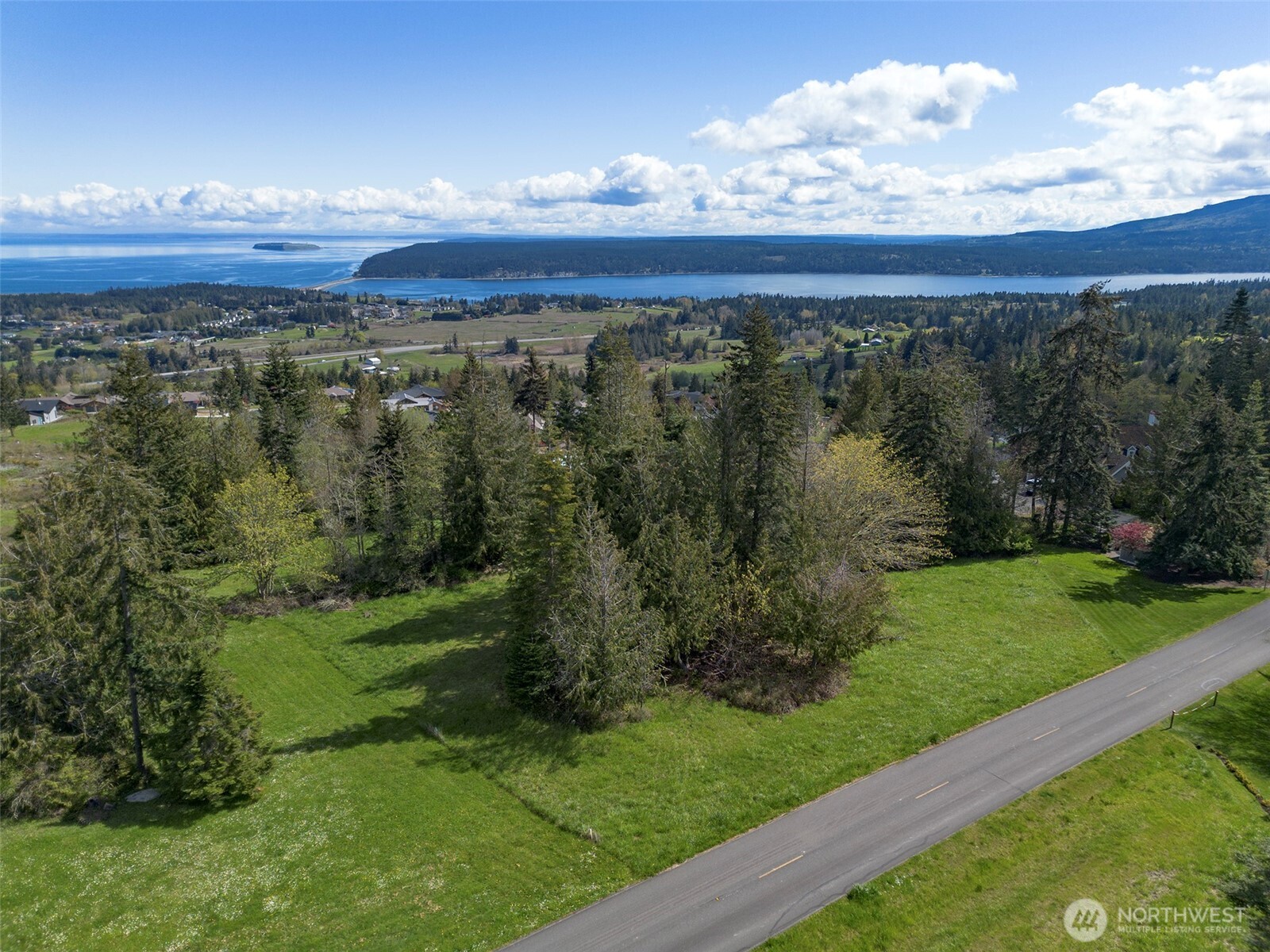 9999 Elk Pass Road Sequim, WA 98382 - Photo 1 of 40 a view of a yard with an outdoor space