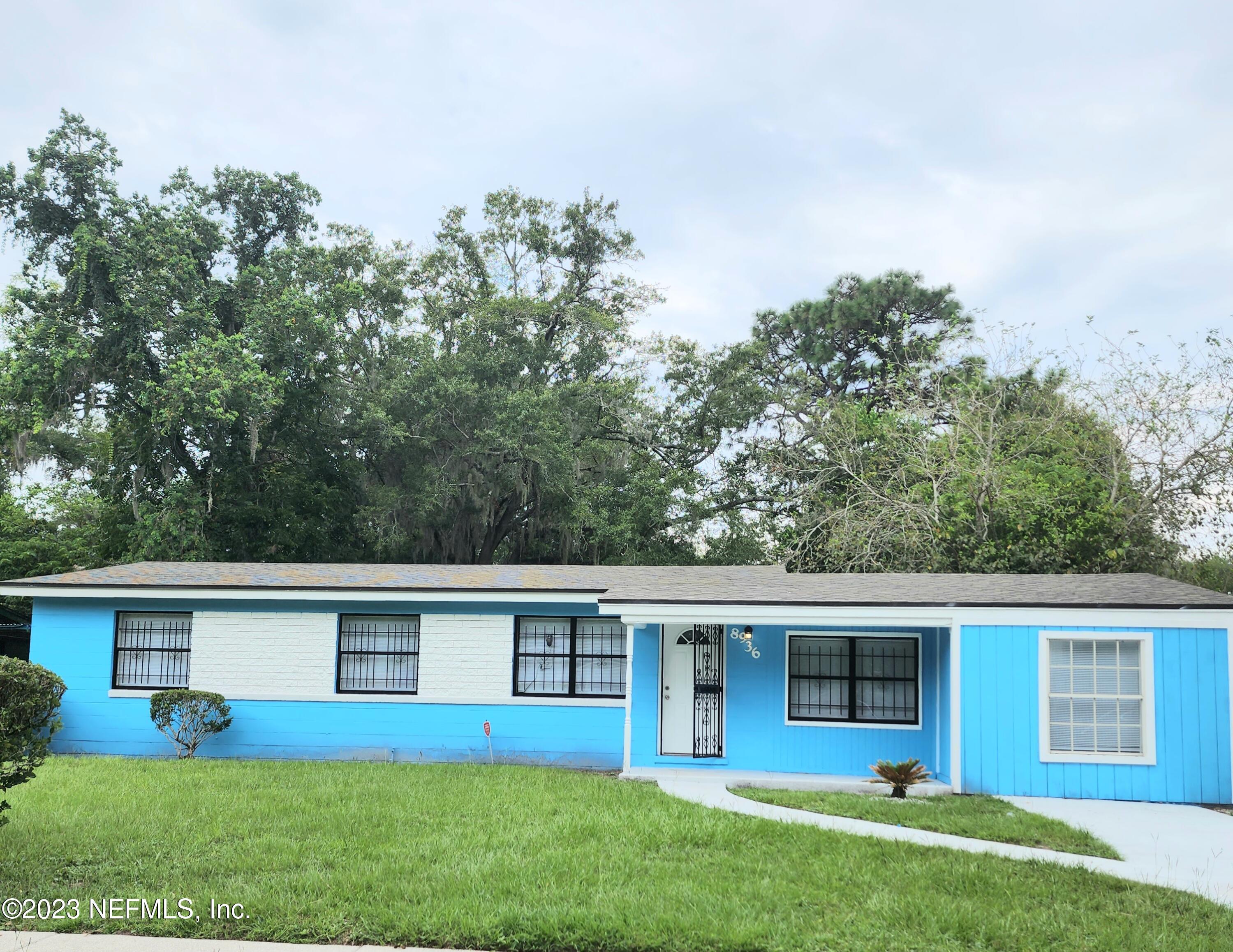 8936 Greenleaf Road Jacksonville, FL 32208 - Photo 1 of 1 front view of house with a yard