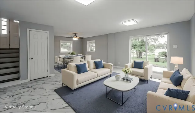 a view of backyard with large trees and a small yard