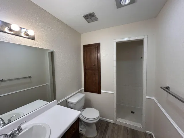 a bathroom with a sink and a toilet