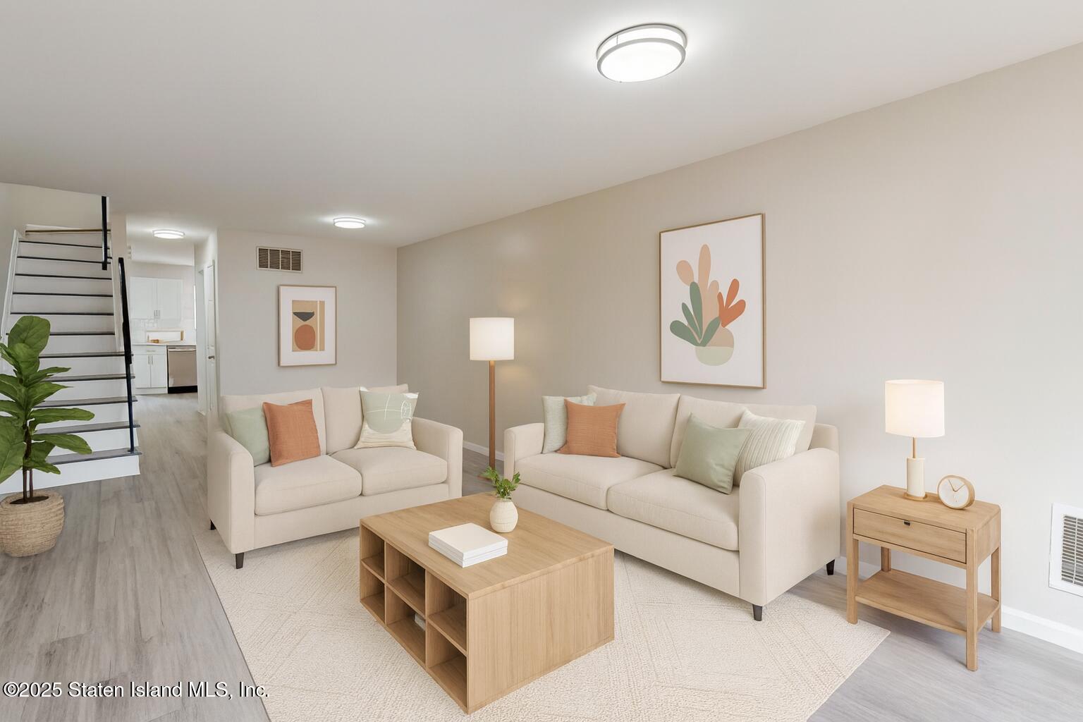 109 Lyceum Court Staten Island, NY 10310 - Photo 3 of 32 a living room with furniture and a couch