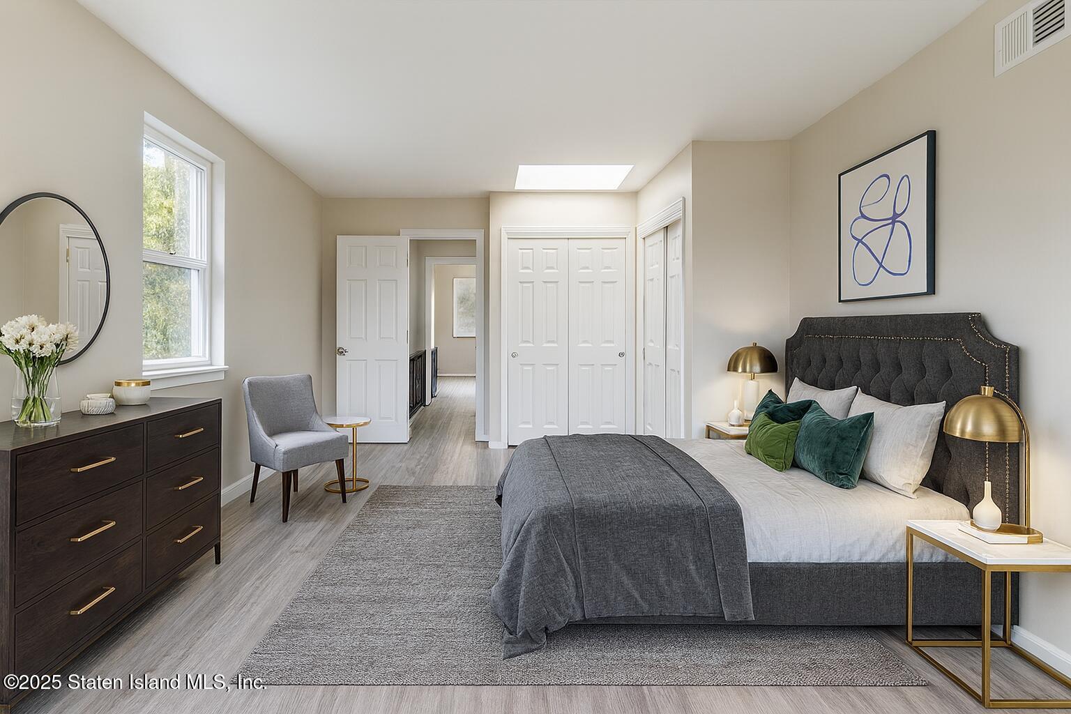 109 Lyceum Court Staten Island, NY 10310 - Photo 5 of 32 a bedroom with a bed and a dresser