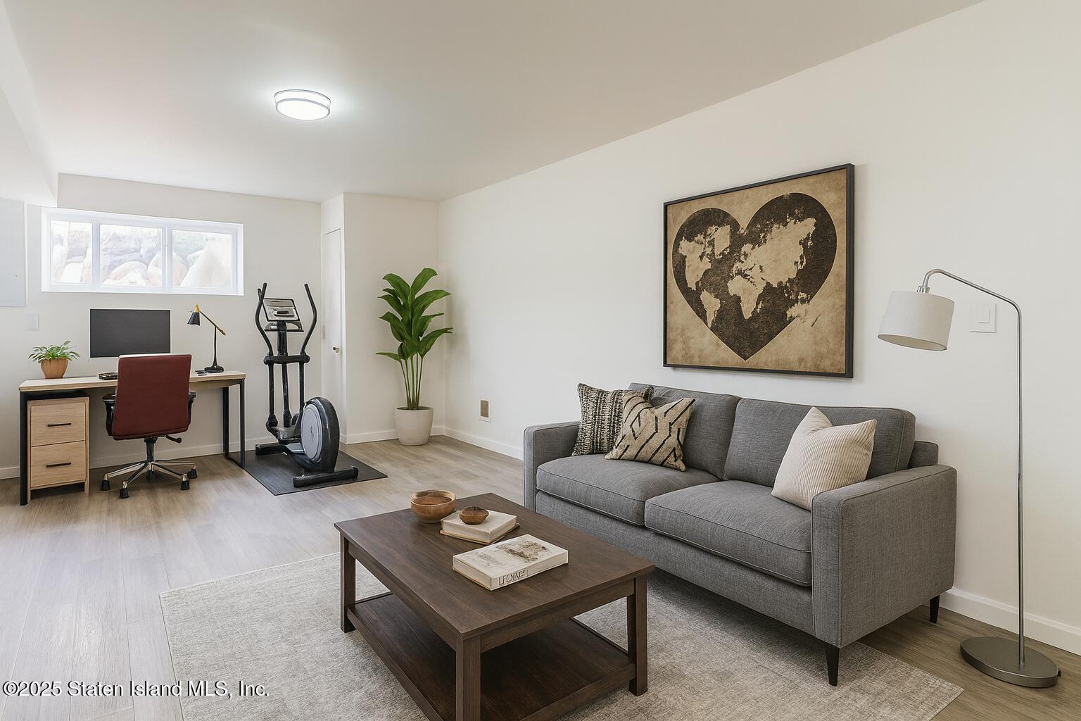 109 Lyceum Court Staten Island, NY 10310 - Photo 9 of 32 a living room with furniture a rug and a window