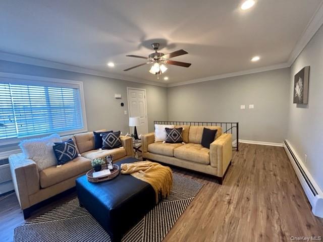 475 Little E Neck Road, Unit L467 West Babylon, NY 11704 - Photo 6 of 6 a living room with furniture and a large window