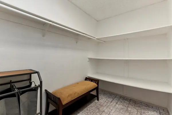 a room with a bed and a window