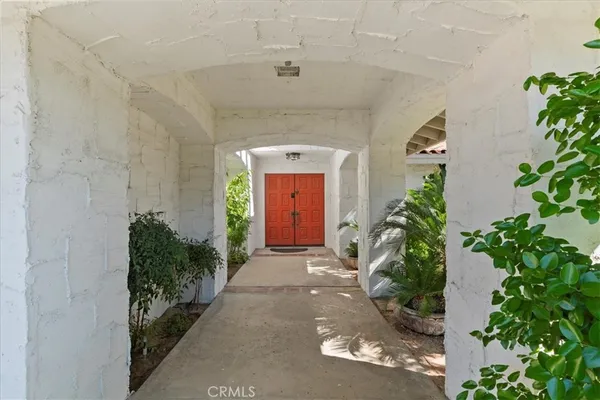 a view of a patio with couches chairs and a table and chairs