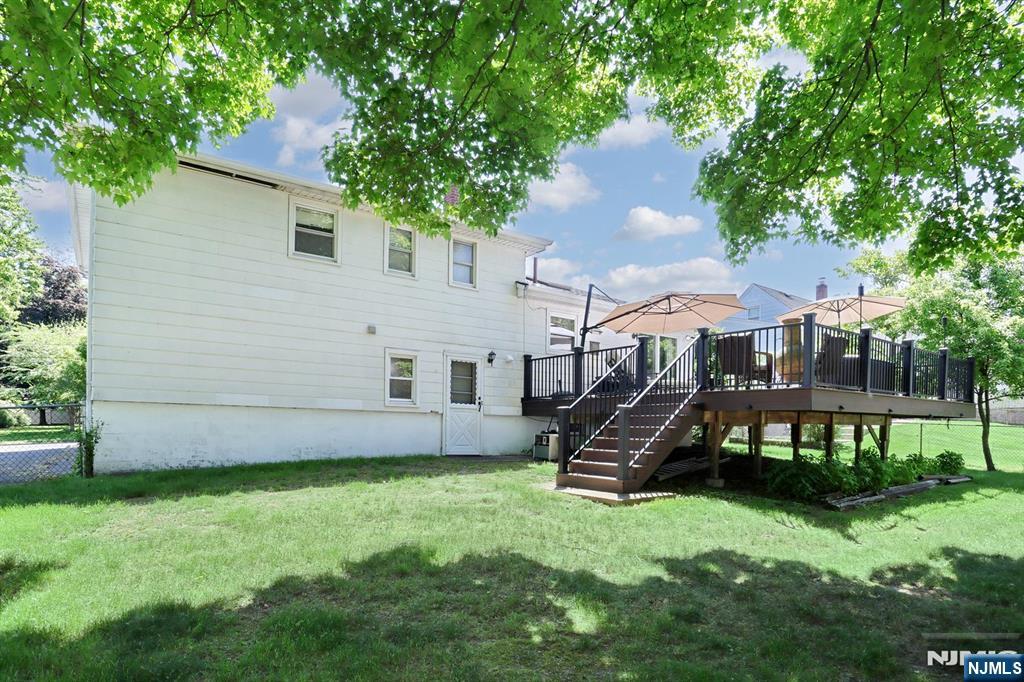 30 Brookfield Road Dumont, NJ 07628 - Photo 41 of 50 a view of a house with backyard