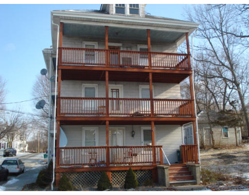 808 Elm Street Woonsocket, RI 02895 - Photo 1 of 7 a view of a house with roof deck