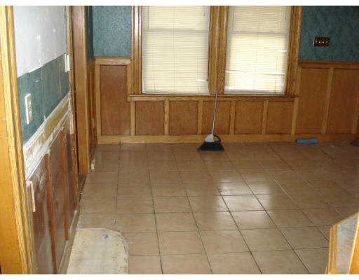 808 Elm Street Woonsocket, RI 02895 - Photo 5 of 7 a view of an empty room with a window