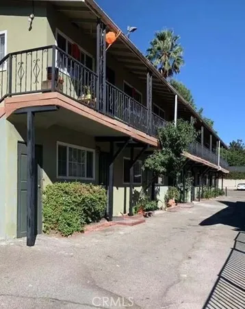 a view of a house with a street