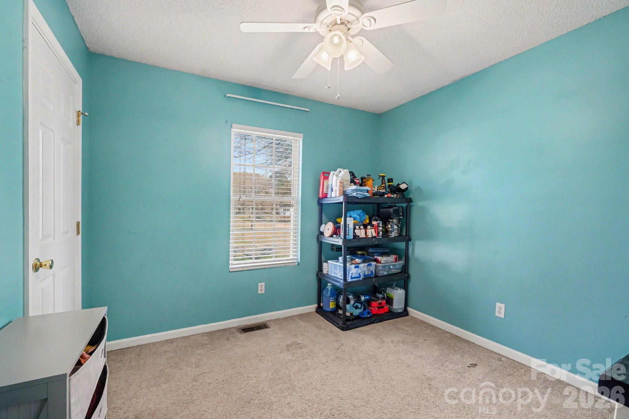 105 Chadwick Circle Dallas, NC 28034 - Photo 16 of 23 a view of an empty room with a window and closet