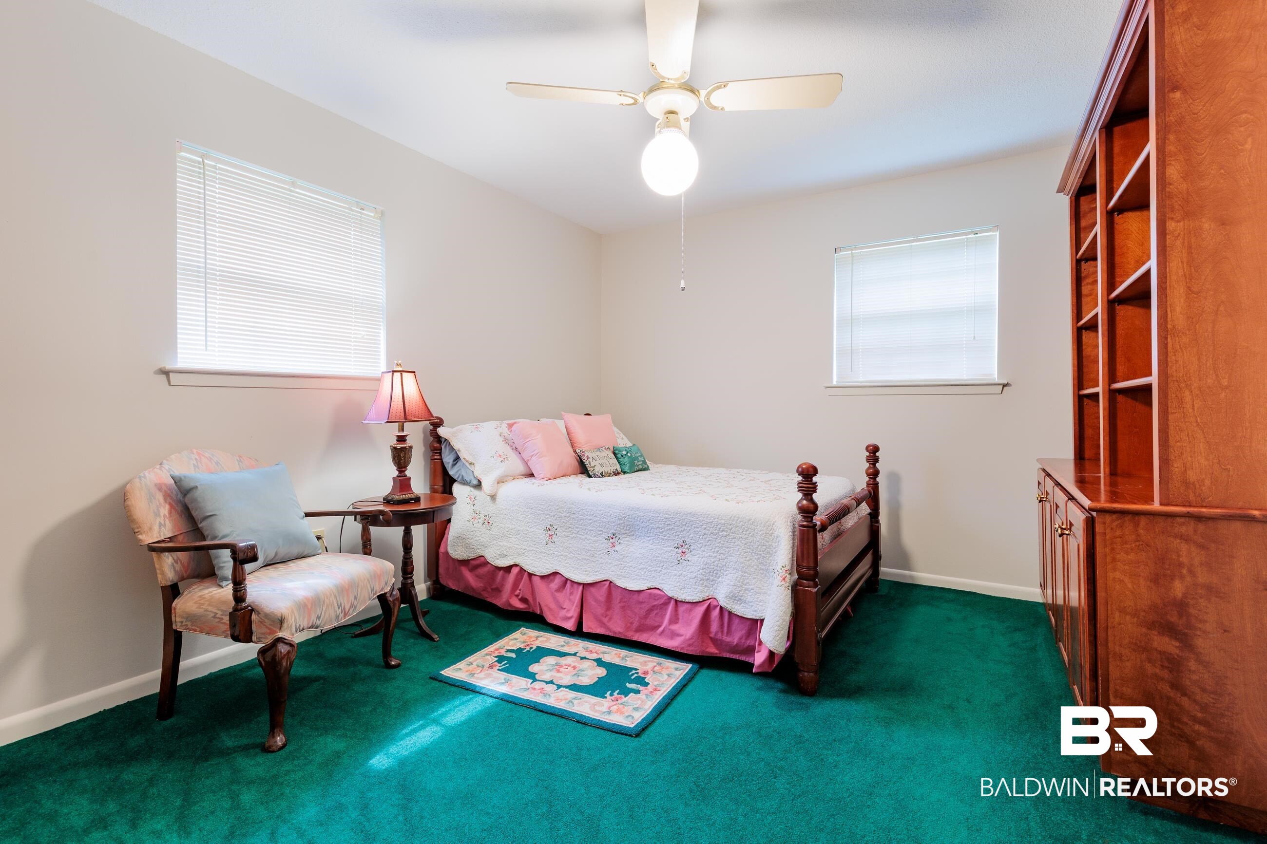1367 Spring Valley Court Mobile, AL 36693 - Photo 13 of 29 Light-toned walls with deep green carpeting