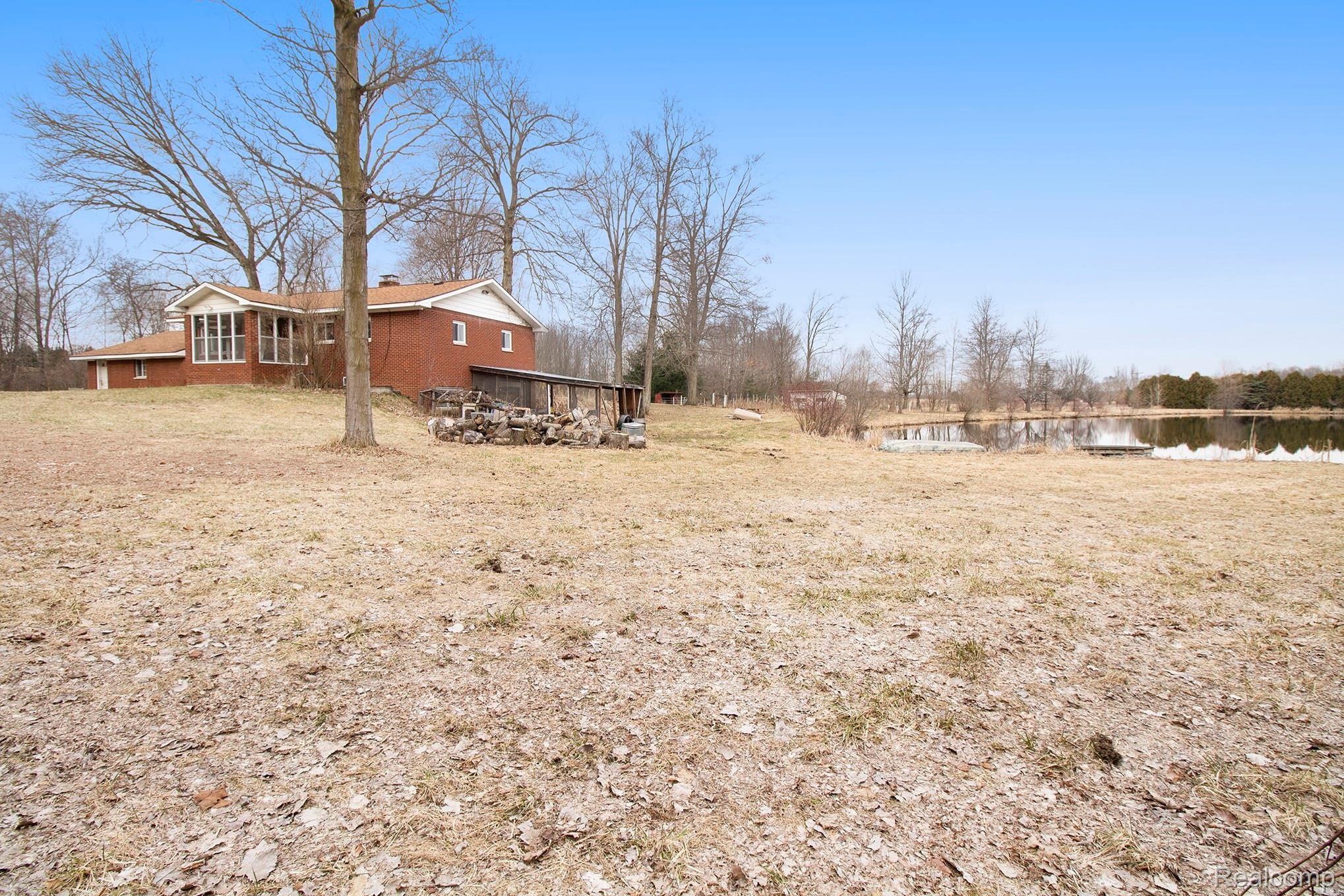 8475 Mason Road Fowlerville, MI 48836 - Photo 7 of 63 amazing setting overlooking the pond