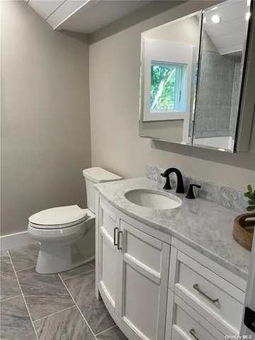 a view of a bathroom with a sink and a toilet
