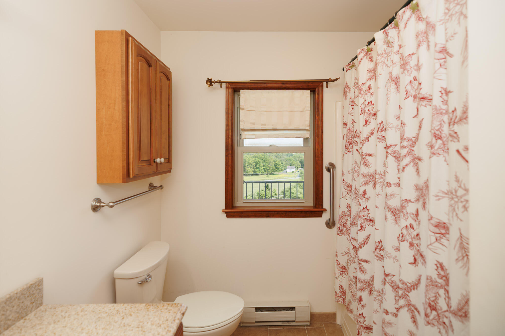 924 Hell Hollow Road Kunkletown, PA 18058 - Photo 29 of 60 a white toilet sitting next to a window and a shower