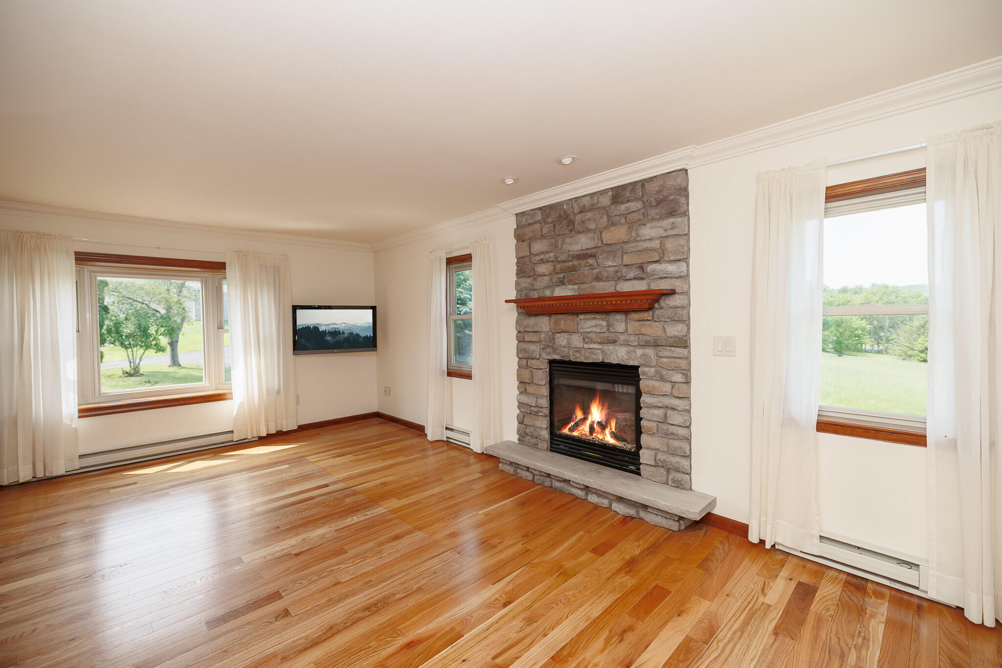 924 Hell Hollow Road Kunkletown, PA 18058 - Photo 33 of 60 a view of an empty room with window and fire place