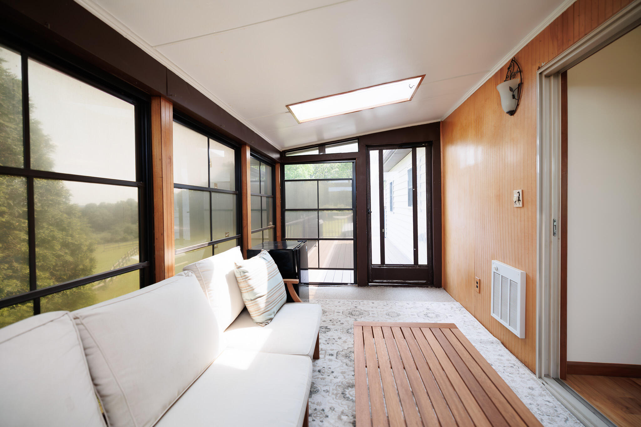 924 Hell Hollow Road Kunkletown, PA 18058 - Photo 36 of 60 a living room with furniture and large windows